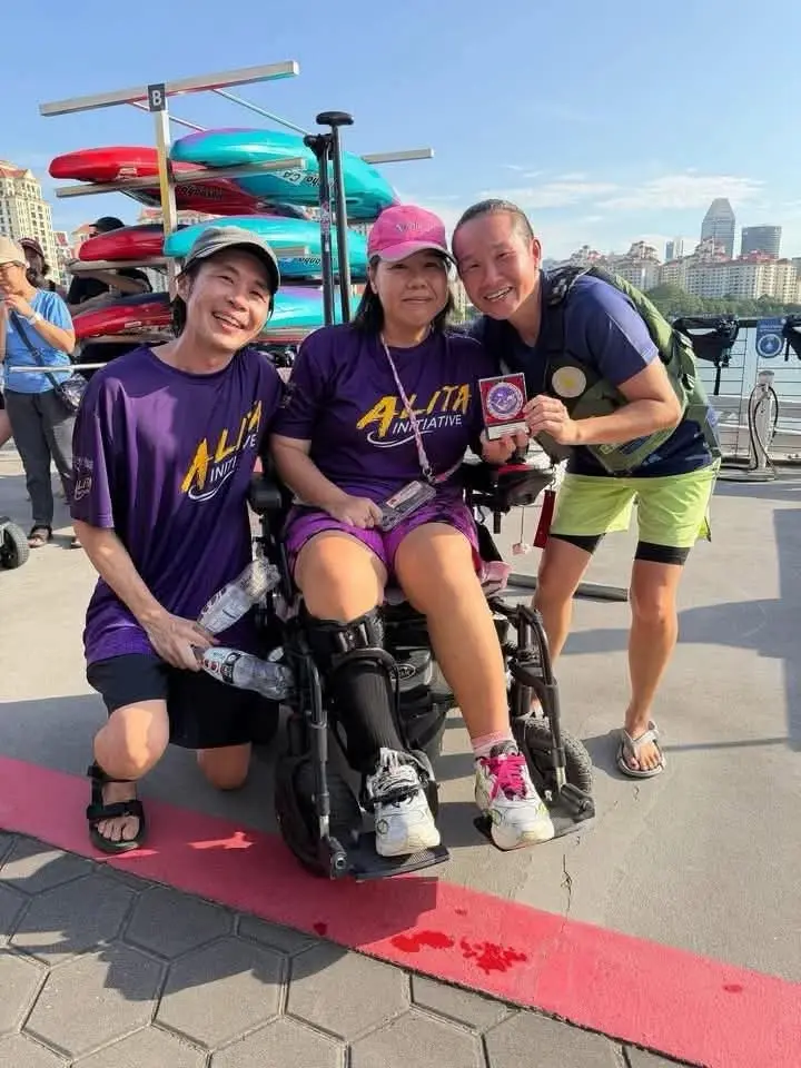 Maya Seah with teammates during a Paradragon activity as part of her active recovery journey in Singapore
